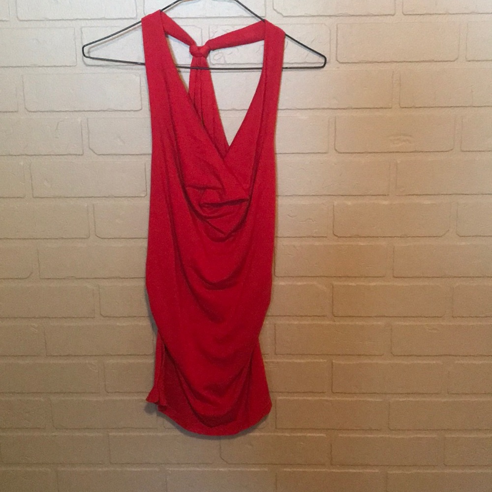 Woman’s red, open back tank top
